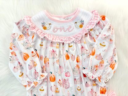pink pumpkin bow first birthday girl romper blush pink orange floral and white outfit, pink and white gingham smocked bubble romper first birthday fall pumpkins ruffle bows embroidered smocked long sleeve 1st birthday outfit romper baby girls, the mod mango, the mod mango baby co baby boutique