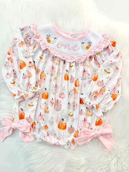 pink pumpkin bow first birthday girl romper blush pink orange floral and white outfit, pink and white gingham smocked bubble romper first birthday fall pumpkins ruffle bows embroidered smocked long sleeve 1st birthday outfit romper baby girls, the mod mango, the mod mango baby co baby boutique