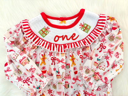 red christmas bow oh what fun it is to be one first birthday girl romper red green white pink outfit, red and white striped stripes ruffle smocked bubble romper first birthday holiday christmas ruffle bows embroidered smocked long sleeve 1st birthday outfit romper baby girls, the mod mango, the mod mango baby co baby boutique