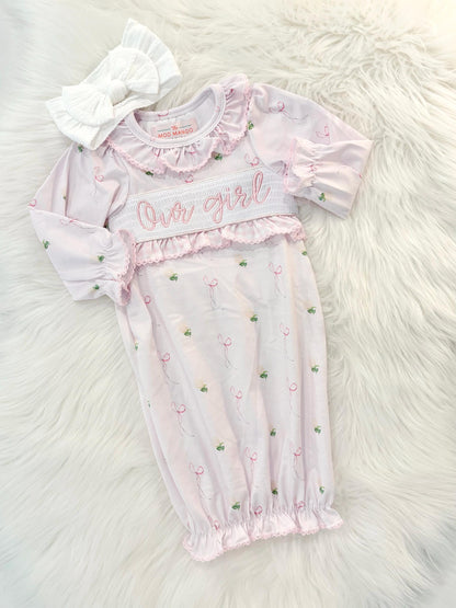 newborn girls pink and white baby gown with flowers for baby girl, our girl monogram baby shower gift for girl, light pink gingham baby gift, newborn coming home outfit, baby shower gift set, pregnancy announcement, custom newborn baby gown, boutique smocked baby gift set, the mod mango baby boutique co