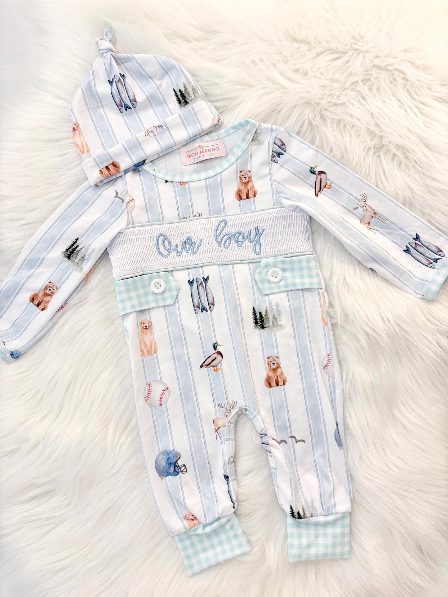 newborn boys baby blue and white smocked baby romper outfit bodysuit and knotted hat with stripes and boy hunting for baby, fish buck deer bear football sports baseball mallard duck puppy dog pine trees outdoor all american boy, our boy monogram baby shower gift for boy, light blue and mint green gingham baby gift, newborn coming home outfit, baby shower gift set, pregnancy announcement, custom newborn baby romper outfit, boutique smocked baby gift set, the mod mango baby boutique co