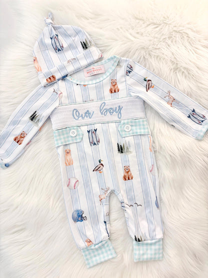 newborn boys baby blue and white smocked baby romper outfit bodysuit and knotted hat with stripes and boy hunting for baby, fish buck deer bear football sports baseball mallard duck puppy dog pine trees outdoor all american boy, our boy monogram baby shower gift for boy, light blue and mint green gingham baby gift, newborn coming home outfit, baby shower gift set, pregnancy announcement, custom newborn baby romper outfit, boutique smocked baby gift set, the mod mango baby boutique co