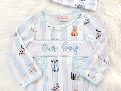 newborn boys baby blue and white smocked baby romper outfit bodysuit and knotted hat with stripes and boy hunting for baby, fish buck deer bear football sports baseball mallard duck puppy dog pine trees outdoor all american boy, our boy monogram baby shower gift for boy, light blue and mint green gingham baby gift, newborn coming home outfit, baby shower gift set, pregnancy announcement, custom newborn baby romper outfit, boutique smocked baby gift set, the mod mango baby boutique co