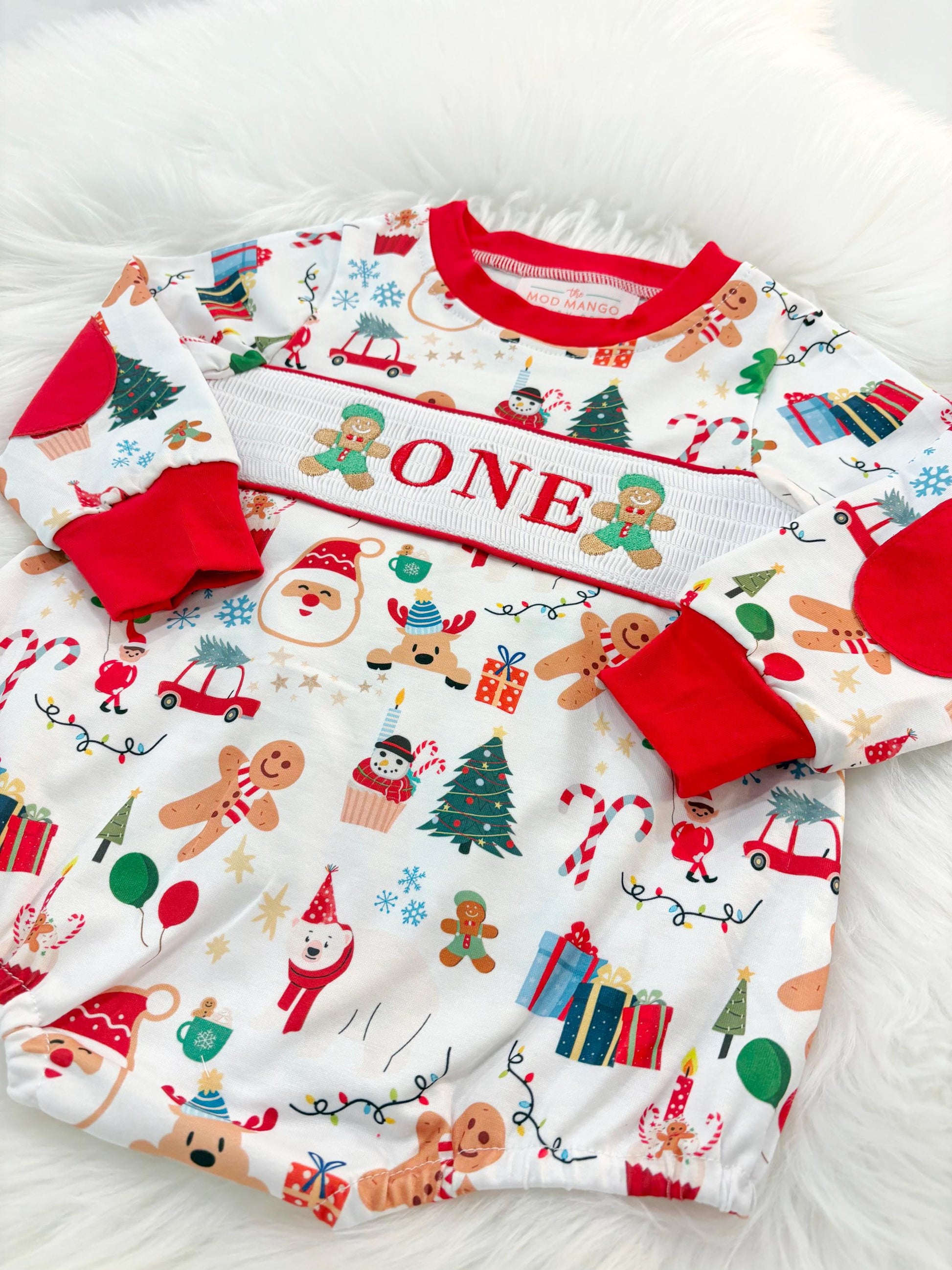 christmas gingerbread one shirt first birthday boy romper red white green blue tan holiday outfit, ONE smocked bubble romper first birthday christmas oh what fun candy canes christmas trees boys, santa claus embroidered smocked 1st birthday outfit romper baby boys, the mod mango baby co baby boutique