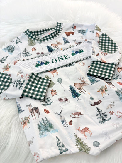 Christmas winter onederland wonderland shirt first birthday boy romper holiday blue brown hunter green white gingham checkered outfit, ONE smocked bubble romper first birthday bear pine trees deer woodland animals, snowflake and pine trees embroidered smocked 1st birthday outfit romper baby boys, the mod mango baby co baby boutique