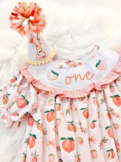 one sweet peach girls first birthday bubble romper outfit peachy blush pink bows first birthday girl romper peach and white outfit, peach smocked dress first birthday embroidered peaches smocked short sleeve 1st birthday outfit ruffle bubble romper baby girls