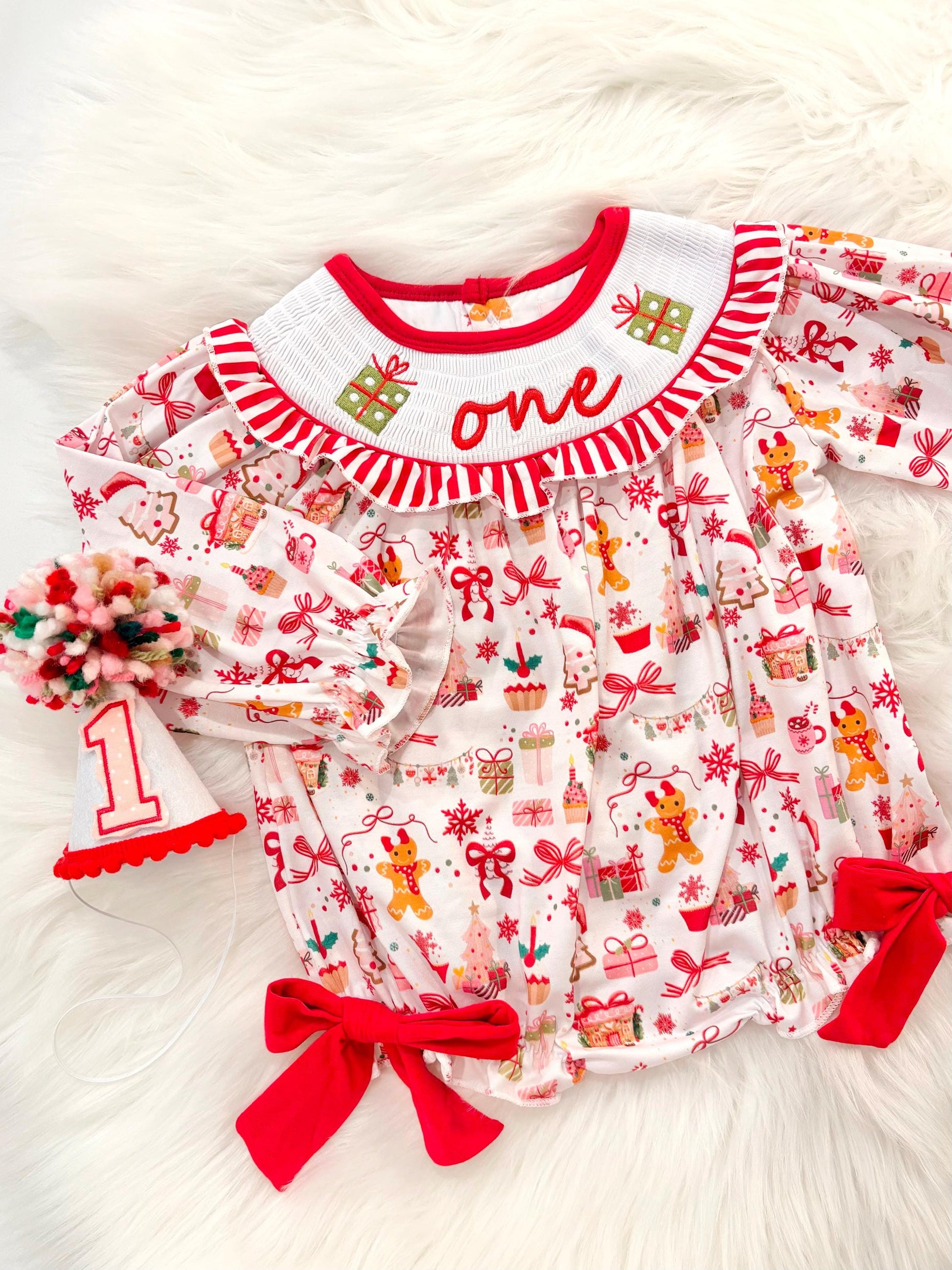 red christmas bow oh what fun it is to be one first birthday girl romper red green white pink outfit, red and white striped stripes ruffle smocked bubble romper first birthday holiday christmas ruffle bows embroidered smocked long sleeve 1st birthday outfit romper baby girls, the mod mango, the mod mango baby co baby boutique