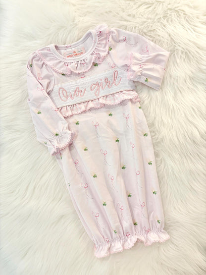 newborn girls pink and white baby gown with flowers for baby girl, our girl monogram baby shower gift for girl, light pink gingham baby gift, newborn coming home outfit, baby shower gift set, pregnancy announcement, custom newborn baby gown, boutique smocked baby gift set, the mod mango baby boutique co