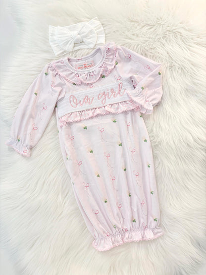 newborn girls pink and white baby gown with flowers and bows coquette for baby girl, our girl monogram baby shower gift for girl, light pink gingham baby gift, newborn coming home outfit, baby shower gift set, pregnancy announcement, custom newborn baby gown, boutique smocked baby gift set, the mod mango baby boutique co