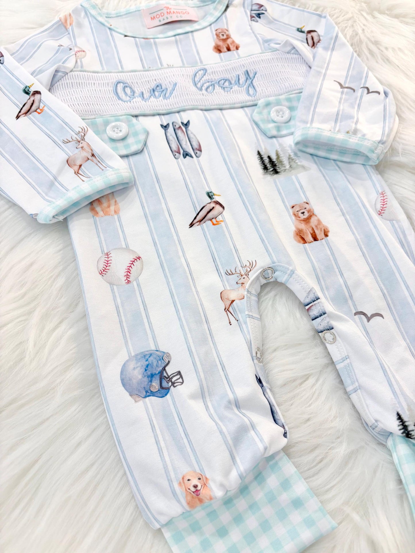 newborn boys baby blue and white smocked baby romper outfit bodysuit and knotted hat with stripes and boy hunting for baby, fish buck deer bear football sports baseball mallard duck puppy dog pine trees outdoor all american boy, our boy monogram baby shower gift for boy, light blue and mint green gingham baby gift, newborn coming home outfit, baby shower gift set, pregnancy announcement, custom newborn baby romper outfit, boutique smocked baby gift set, the mod mango baby boutique co