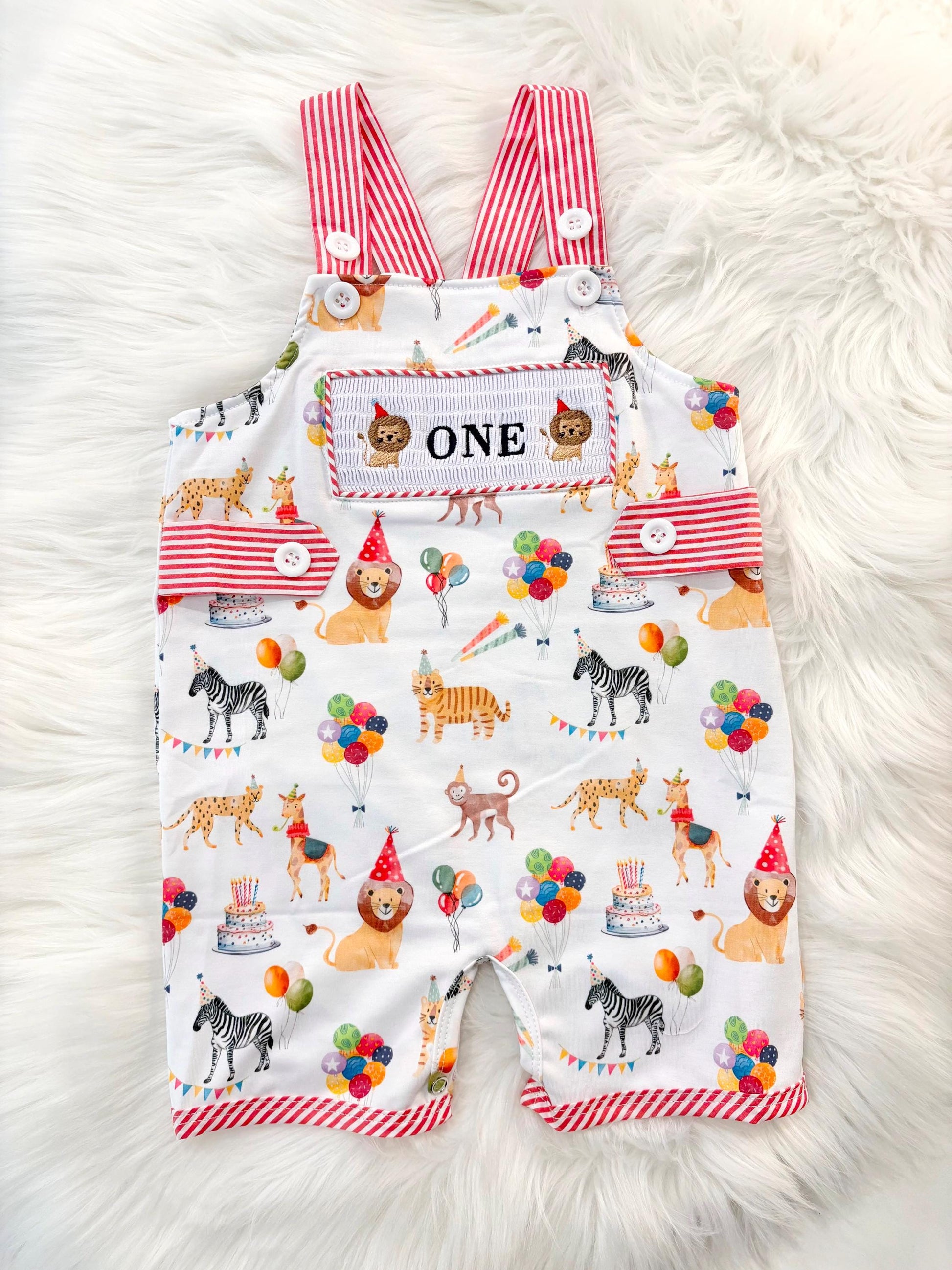 carnival circus party animal cake smash outfit first birthday boy romper 1st birthday red  and white striped stripes colorful smash cake outfit overalls, ONE smocked romper first birthday, animals lion embroidered smocked spring summer 1st birthday boy outfit romper baby boys cake smash outfit, the mod mango baby boutique co