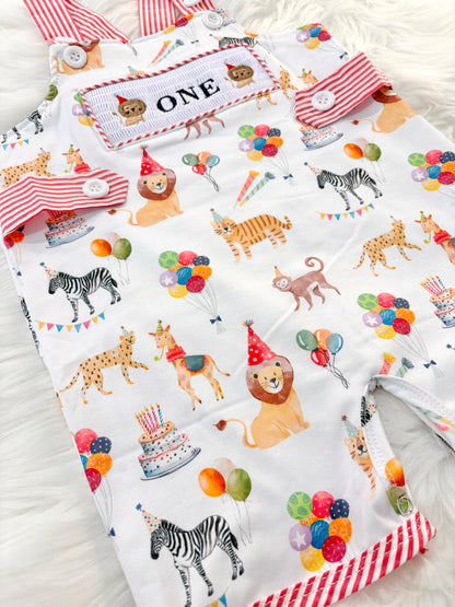 carnival circus party animal cake smash outfit first birthday boy romper 1st birthday red  and white striped stripes colorful smash cake outfit overalls, ONE smocked romper first birthday, animals lion embroidered smocked spring summer 1st birthday boy outfit romper baby boys cake smash outfit, the mod mango baby boutique co
