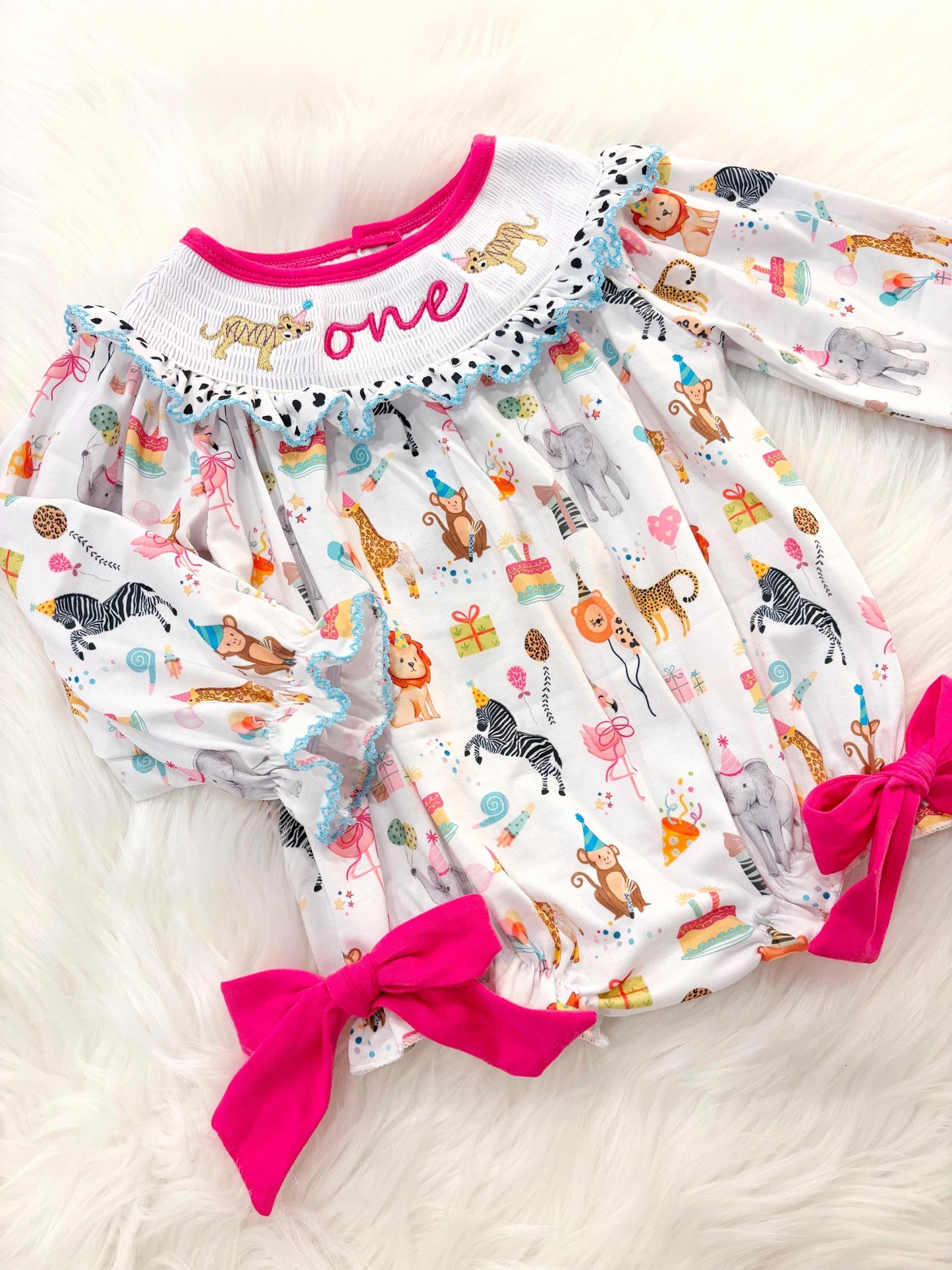 zoo party circus animal first birthday outfit, pink first birthday smocked bubble romper outfit hot pink animal print bow ruffle first birthday girl romper pink and white outfit, colorful rainbow pink turquoise white smocked bubble romper first birthday winter bows ruffle bows  embroidered smocked long sleeve 1st birthday outfit romper baby girls, the mod mango baby boutique co