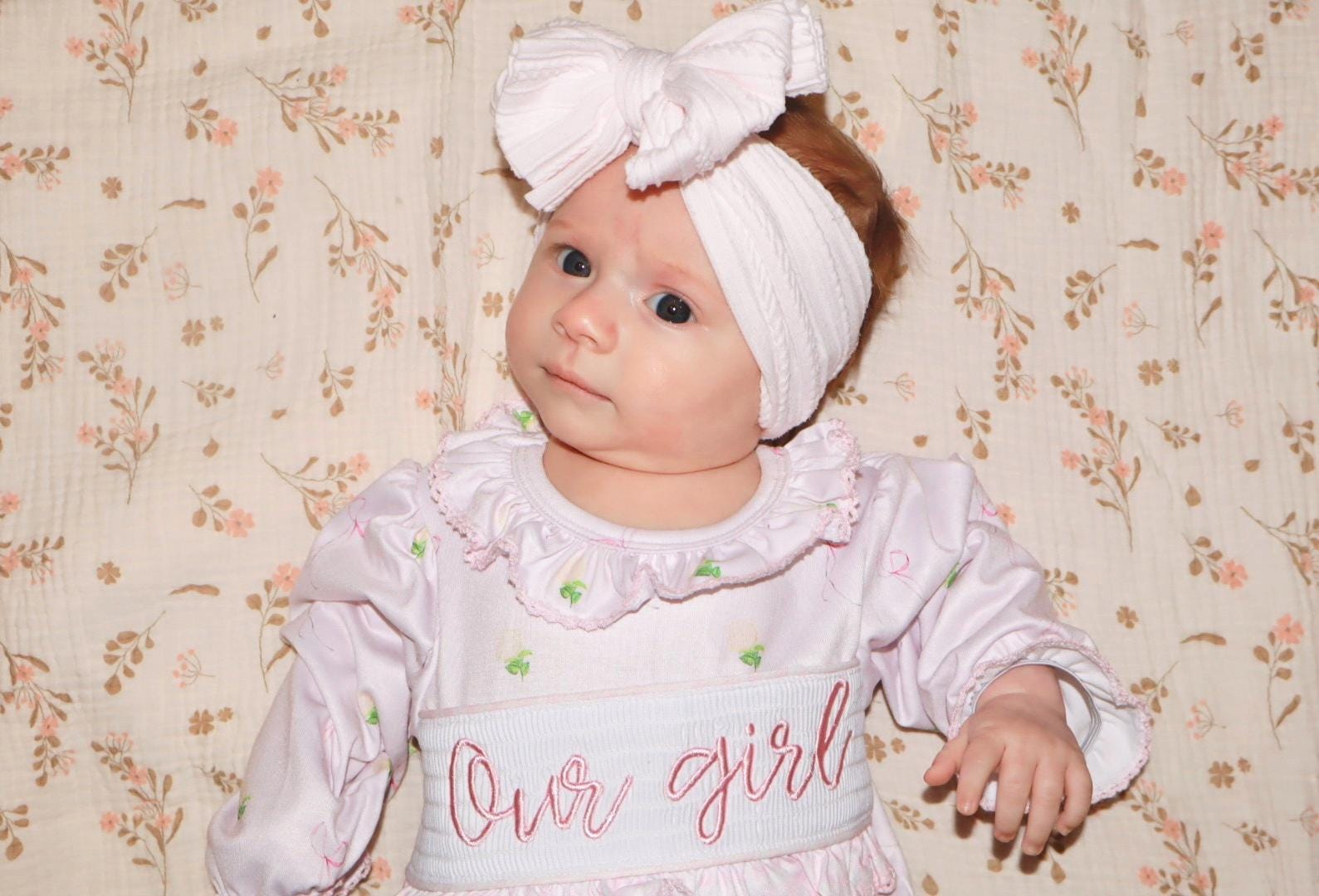 newborn girls pink and white baby gown with flowers and bows coquette for baby girl, our girl monogram baby shower gift for girl, light pink gingham baby gift, newborn coming home outfit, baby shower gift set, pregnancy announcement, custom newborn baby gown, boutique smocked baby gift set, the mod mango baby boutique co