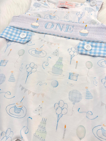 blue and white gingham checkered first birthday cupcakes romper pants outfit, one is fun first birthday outfit, it's fun to be one first birthday boy romper blue green longtalls blue white gingham smash cake outfit overalls, ONE smocked romper first birthday party hats, balloons embroidered smocked spring summer fall 1st birthday boy outfit romper baby boys 1st birthday cake smash outfit, the mod mango baby boutique co, boys first birthday outfit theme