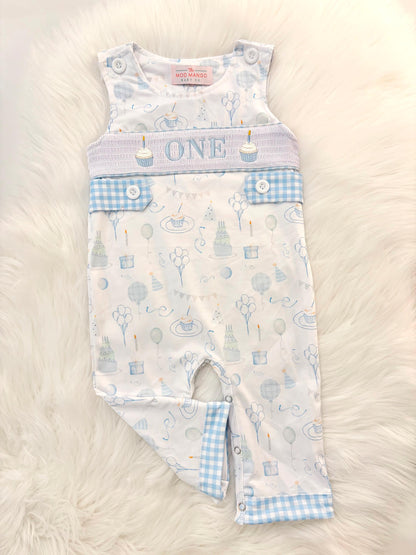 blue and white gingham checkered first birthday cupcakes romper pants outfit, one is fun first birthday outfit, it&#39;s fun to be one first birthday boy romper blue green longtalls blue white gingham smash cake outfit overalls, ONE smocked romper first birthday party hats, balloons embroidered smocked spring summer fall 1st birthday boy outfit romper baby boys 1st birthday cake smash outfit, the mod mango baby boutique co, boys first birthday outfit theme
