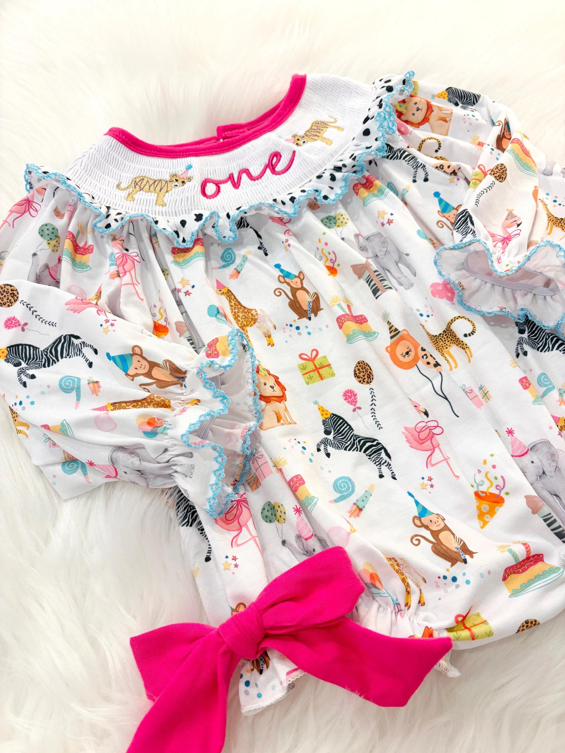 zoo party circus animal first birthday outfit, pink first birthday smocked bubble romper outfit hot pink animal print bow ruffle first birthday girl romper pink and white outfit, colorful rainbow pink turquoise white smocked bubble romper first birthday winter bows ruffle bows  embroidered smocked long sleeve 1st birthday outfit romper baby girls, the mod mango baby boutique co