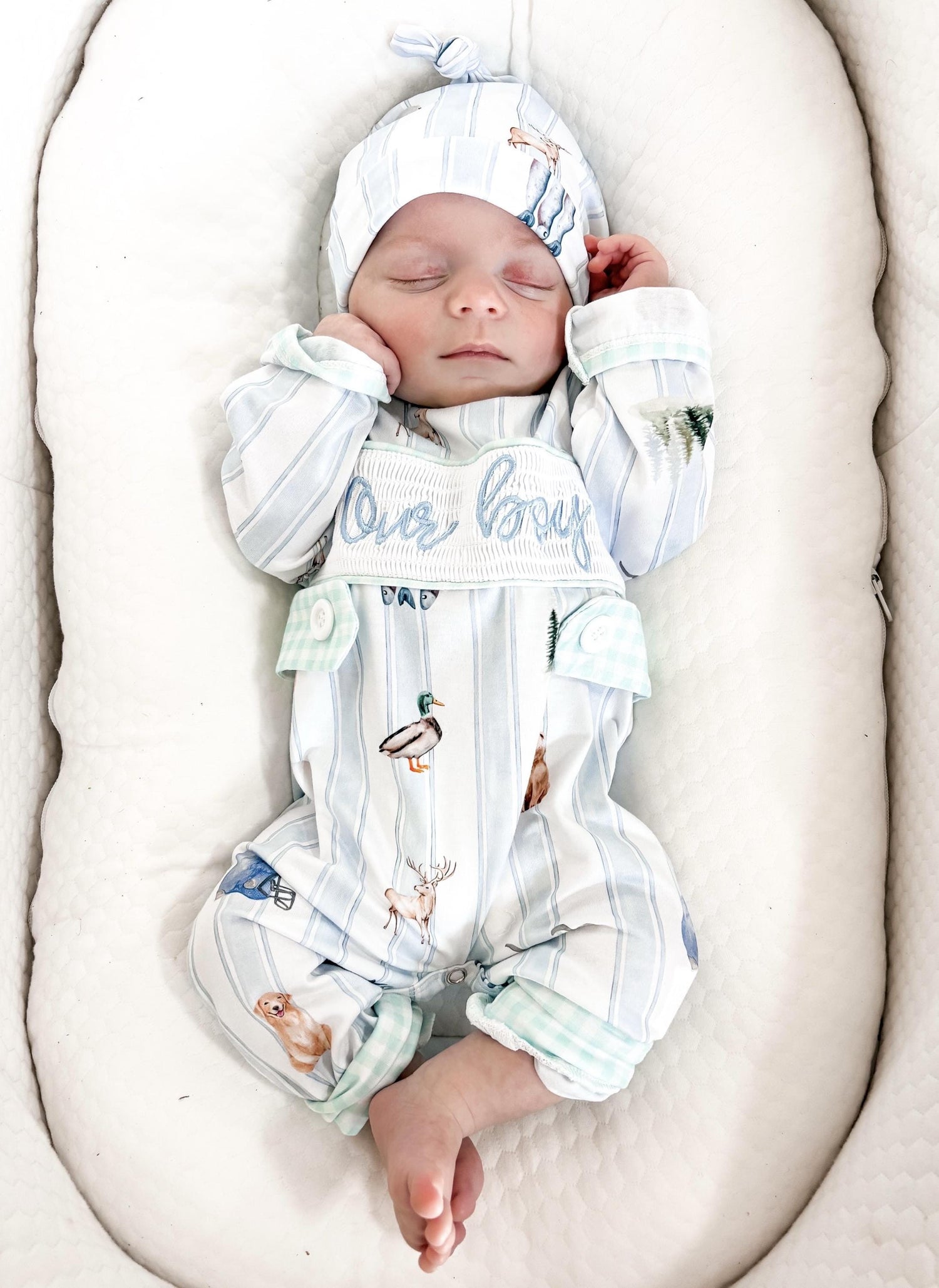 preppy newborn boys baby blue and white smocked baby romper outfit bodysuit and knotted hat with stripes and boy hunting for baby, fish buck deer bear football sports baseball mallard duck puppy dog pine trees outdoor all american boy, our boy monogram baby shower gift for boy, light blue and mint green gingham baby gift, newborn coming home outfit, baby shower gift set, pregnancy announcement, custom newborn baby romper outfit, boutique smocked baby gift set, the mod mango baby boutique co