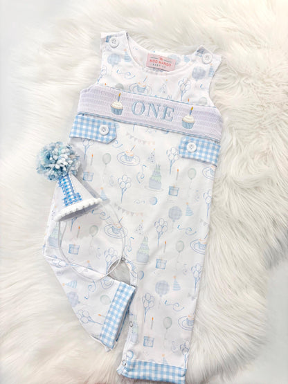blue and white gingham checkered first birthday romper pants outfit, one is fun first birthday outfit, it's fun to be one first birthday boy romper blue green longtalls blue white gingham smash cake outfit overalls, ONE smocked romper first birthday party hats, balloons embroidered smocked spring summer fall 1st birthday boy outfit romper baby boys 1st birthday cake smash outfit, the mod mango baby boutique co, boys first birthday outfit theme