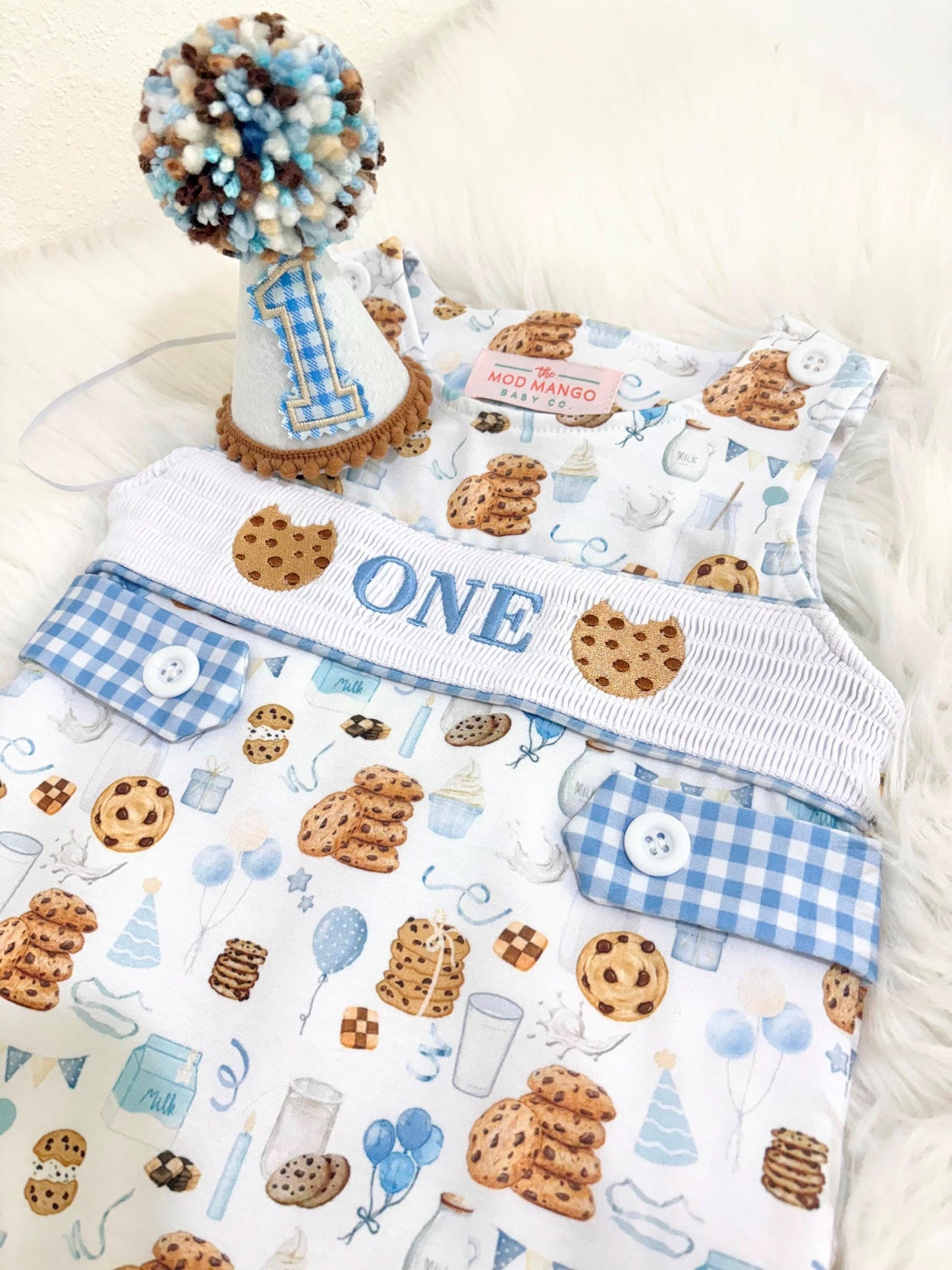 milk and cookies birthday boy romper sweet one cookies shortalls brown tan blue white gingham smash cake outfit overalls, ONE smocked romper first birthday cookies, milk and cookies embroidered smocked spring summer fall 1st birthday boy outfit romper baby boys sweets 1st birthday