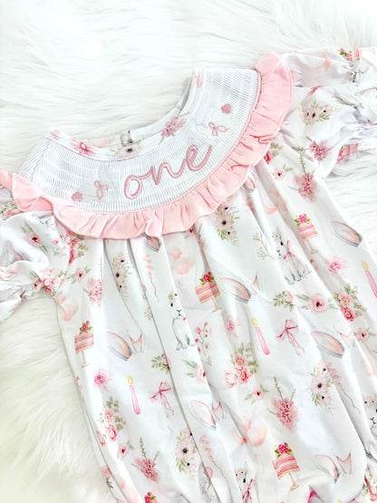 some bunny is one  pink bow first birthday girl romper pink and white outfit, girls one pink white smocked romper dress first birthday spring bunny rabbit easter bow ruffle embroidered smocked short sleeve 1st birthday outfit romper baby girls, the mod mango baby boutique co