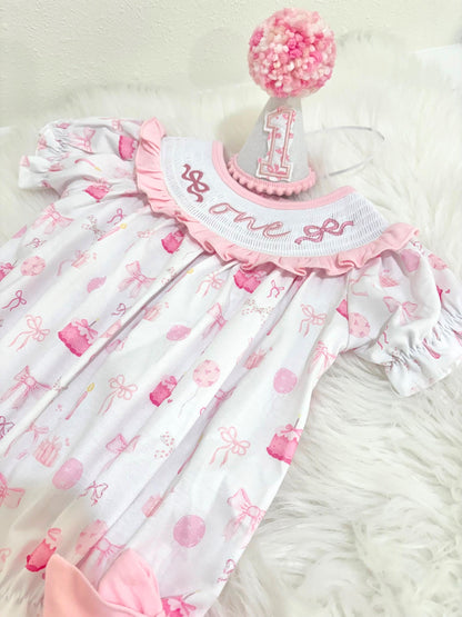 pink bow first birthday girl romper pink and white outfit, pink white smocked bubble romper first birthday winter bows ruffle bows  embroidered smocked long sleeve 1st birthday outfit romper baby girls the mod mango baby boutique