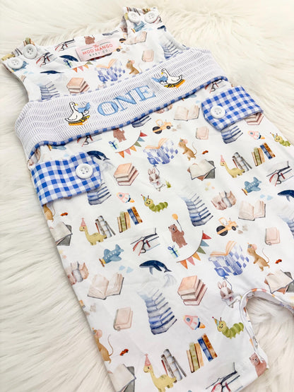 books birthday boy romper one for the books shortalls blue white gingham smash cake outfit overalls, ONE smocked romper first birthday books, storybooks baby goose embroidered smocked spring summer fall 1st birthday boy outfit romper baby boys reading 1st birthday, the mod mango baby co