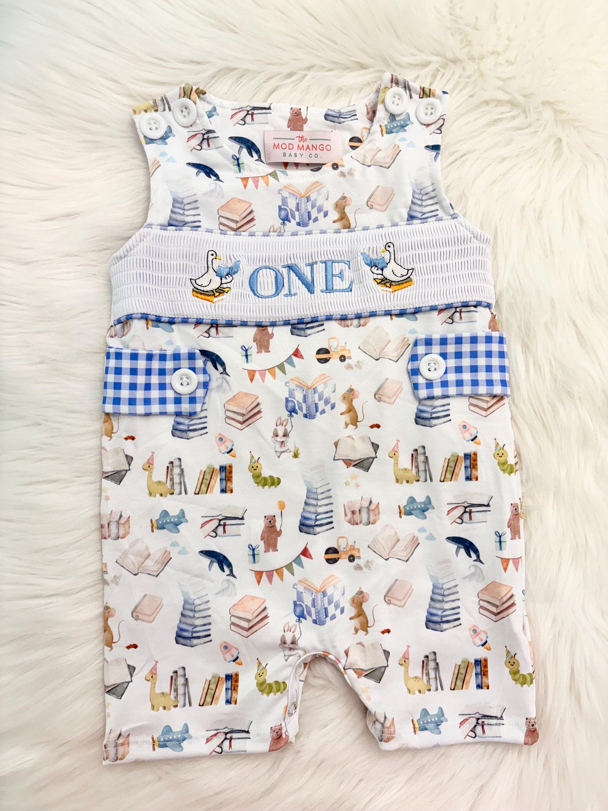 books birthday boy romper one for the books shortalls blue white gingham smash cake outfit overalls, ONE smocked romper first birthday books, storybooks baby goose embroidered smocked spring summer fall 1st birthday boy outfit romper baby boys reading 1st birthday, the mod mango baby co