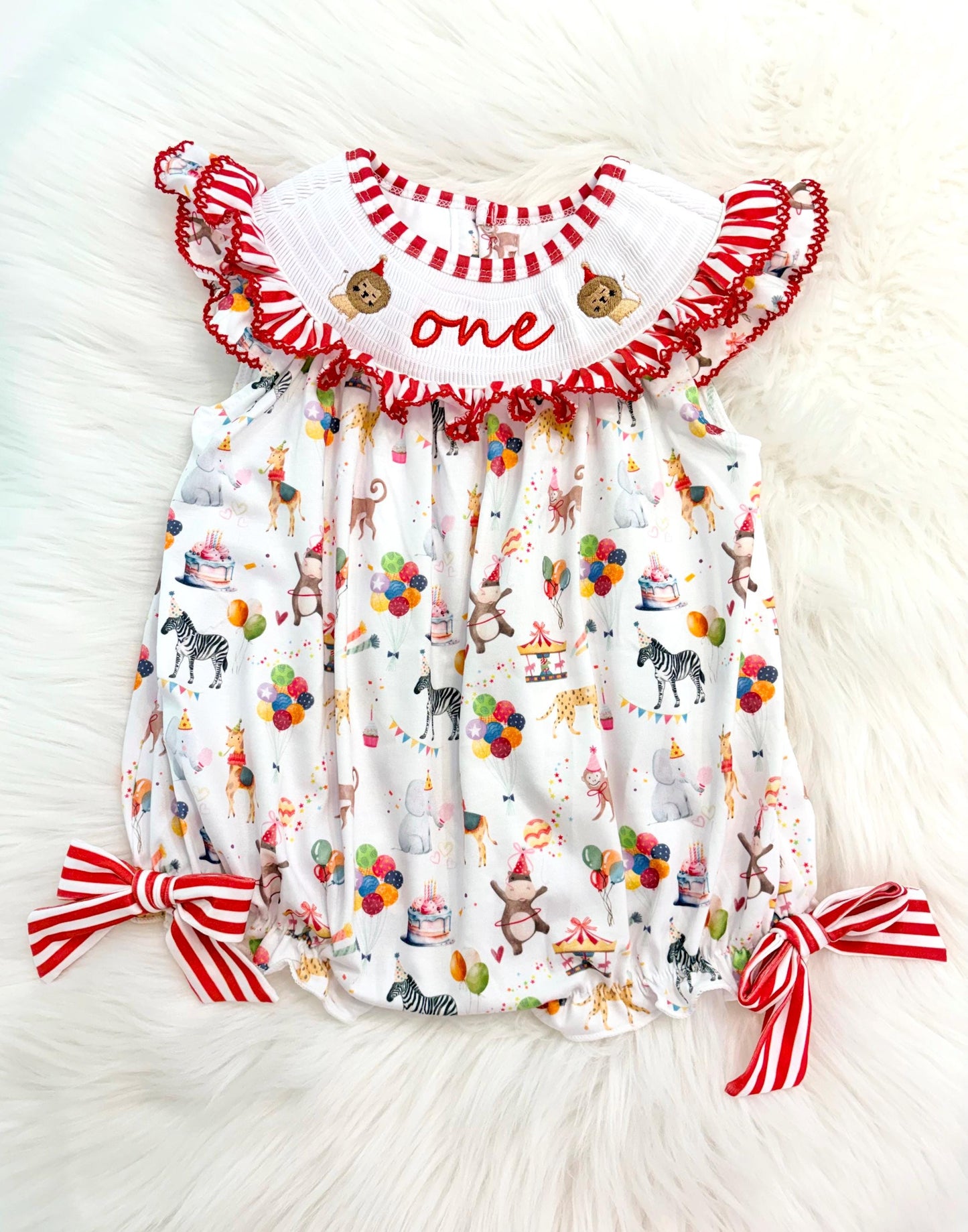 carnival circus party animal cake smash outfit first birthday girl romper 1st birthday red and white striped stripes colorful smash cake outfit bubble romper flutter sleeves, ONE smocked romper first birthday, animals lion embroidered smocked spring summer 1st birthday girl outfit romper baby girls cake smash outfit, the mod mango baby boutique co