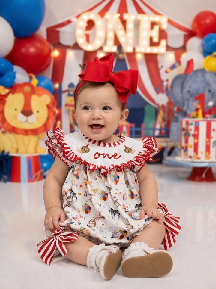 carnival circus party animal cake smash outfit first birthday girl romper 1st birthday red and white striped stripes colorful smash cake outfit bubble romper flutter sleeves, ONE smocked romper first birthday, animals lion embroidered smocked spring summer 1st birthday girl outfit romper baby girls cake smash outfit, the mod mango baby boutique co
