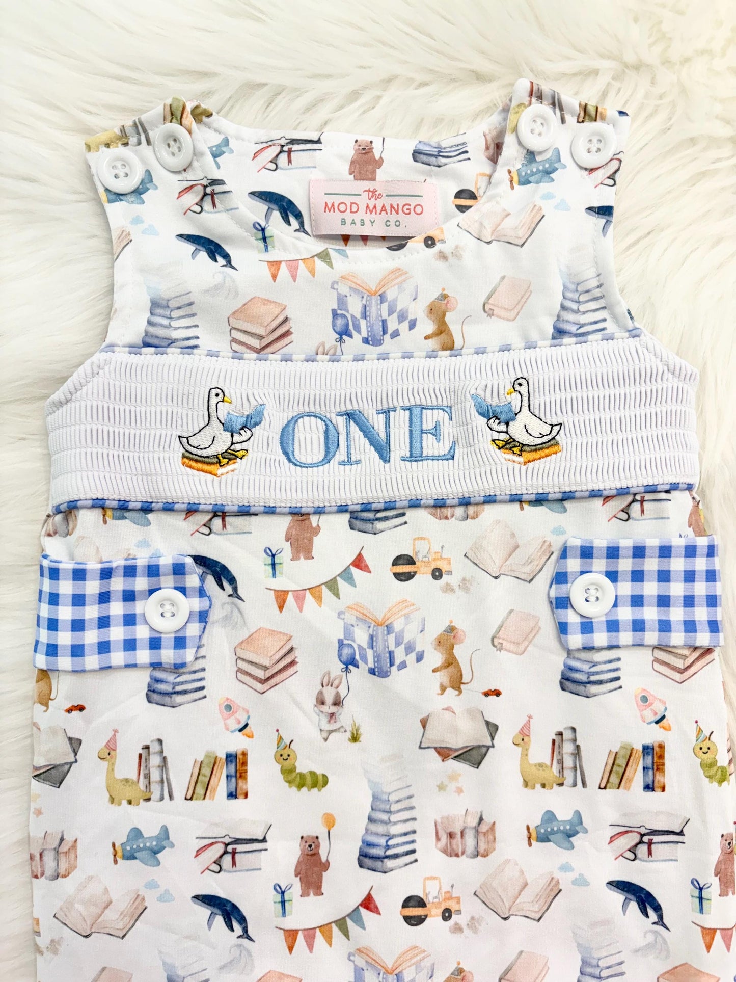 books birthday boy romper one for the books shortalls blue white gingham smash cake outfit overalls, ONE smocked romper first birthday books, storybooks baby goose embroidered smocked spring summer fall 1st birthday boy outfit romper baby boys reading 1st birthday, the mod mango baby co