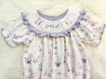 lavender purple butterfly flowers bows first birthday girl romper pink pastel floral and white outfit, pink lavender and white smocked bubble romper butterflies first birthday one year fluttered by ruffle bows embroidered smocked 1st birthday outfit romper baby girls, the mod mango, the mod mango baby co baby boutique