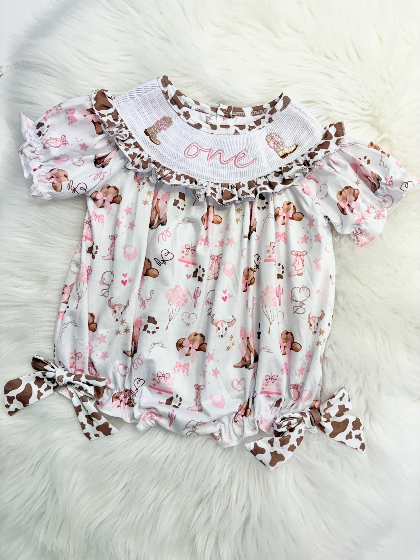 my first rodeo cowgirl girls first birthday bubble romper outfit pink bows brown cow print first birthday holy cow i'm one girl romper pink and white outfit, cowgirl boots pink smocked dress first birthday embroidered cow smocked short sleeve 1st birthday outfit ruffle dress baby girls, the mod mango