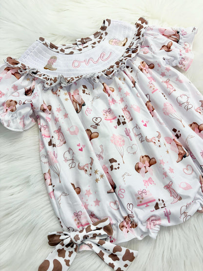 my first rodeo cowgirl girls first birthday bubble romper outfit pink bows brown cow print first birthday holy cow i'm one girl romper pink and white outfit, cowgirl boots pink smocked dress first birthday embroidered cow smocked short sleeve 1st birthday outfit ruffle dress baby girls, the mod mango