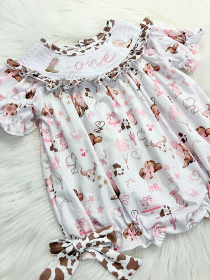 my first rodeo cowgirl girls first birthday bubble romper outfit pink bows brown cow print first birthday holy cow i'm one girl romper pink and white outfit, cowgirl boots pink smocked dress first birthday embroidered cow smocked short sleeve 1st birthday outfit ruffle dress baby girls, the mod mango