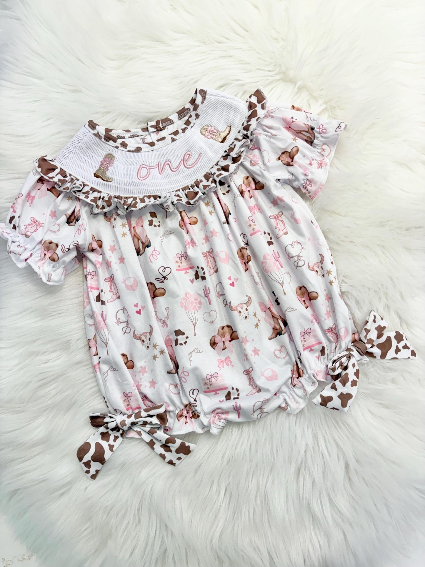 my first rodeo cowgirl girls first birthday bubble romper outfit pink bows brown cow print first birthday holy cow i'm one girl romper pink and white outfit, cowgirl boots pink smocked dress first birthday embroidered cow smocked short sleeve 1st birthday outfit ruffle dress baby girls, the mod mango