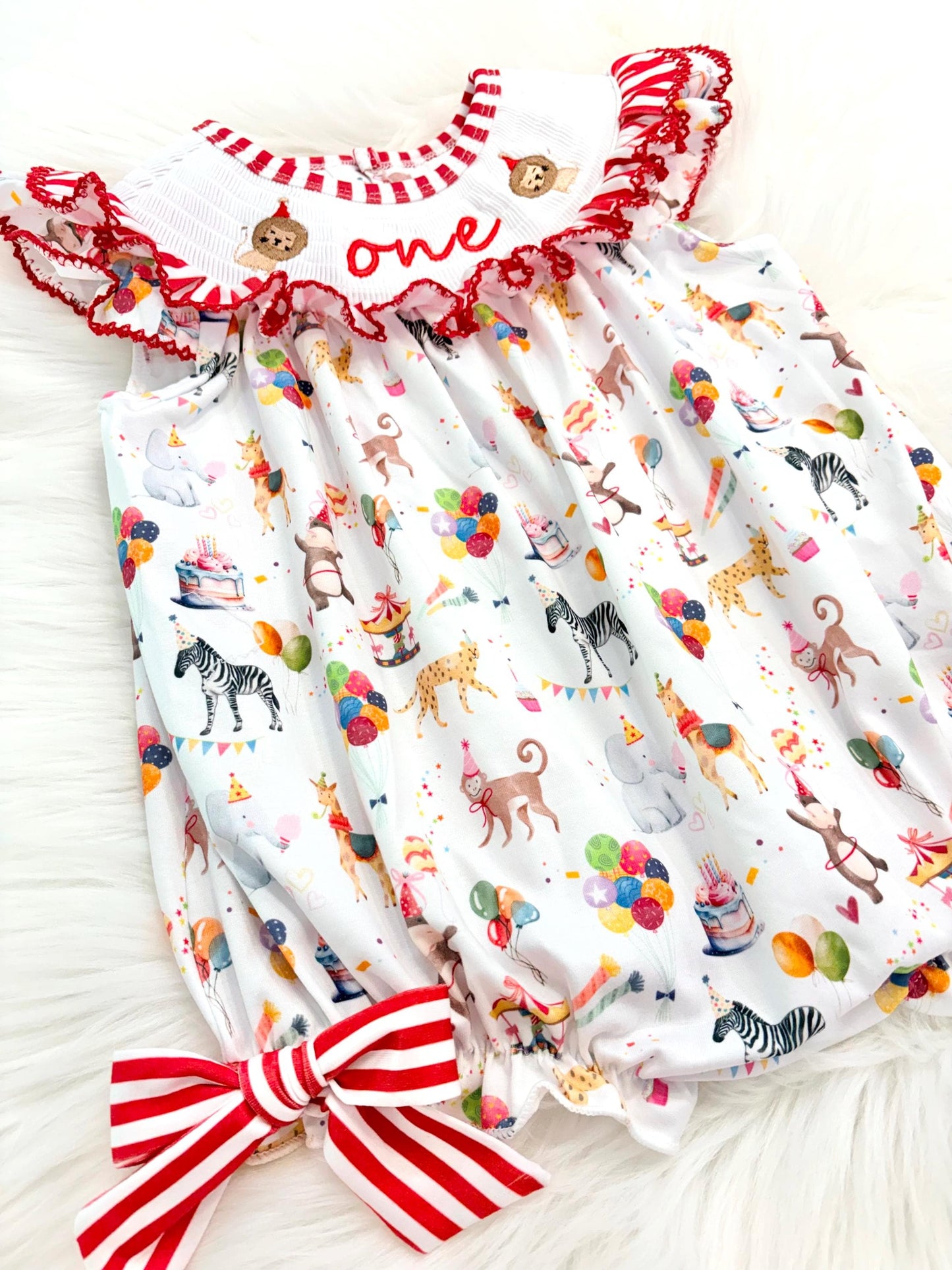 carnival circus party animal cake smash outfit first birthday girl romper 1st birthday red and white striped stripes colorful smash cake outfit bubble romper flutter sleeves, ONE smocked romper first birthday, animals lion embroidered smocked spring summer 1st birthday girl outfit romper baby girls cake smash outfit, the mod mango baby boutique co