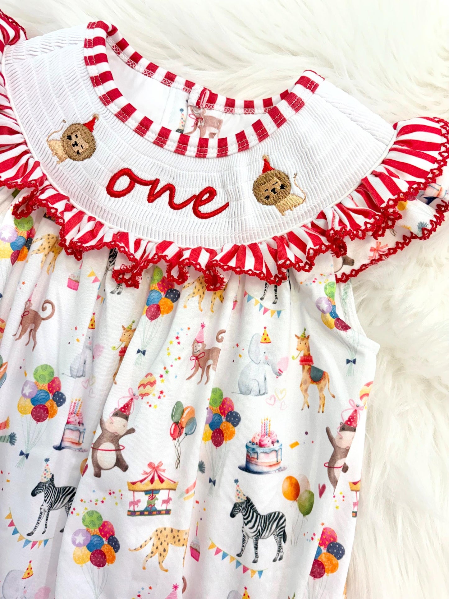 carnival circus party animal cake smash outfit first birthday girl romper 1st birthday red and white striped stripes colorful smash cake outfit bubble romper flutter sleeves, ONE smocked romper first birthday, animals lion embroidered smocked spring summer 1st birthday girl outfit romper baby girls cake smash outfit, the mod mango baby boutique co