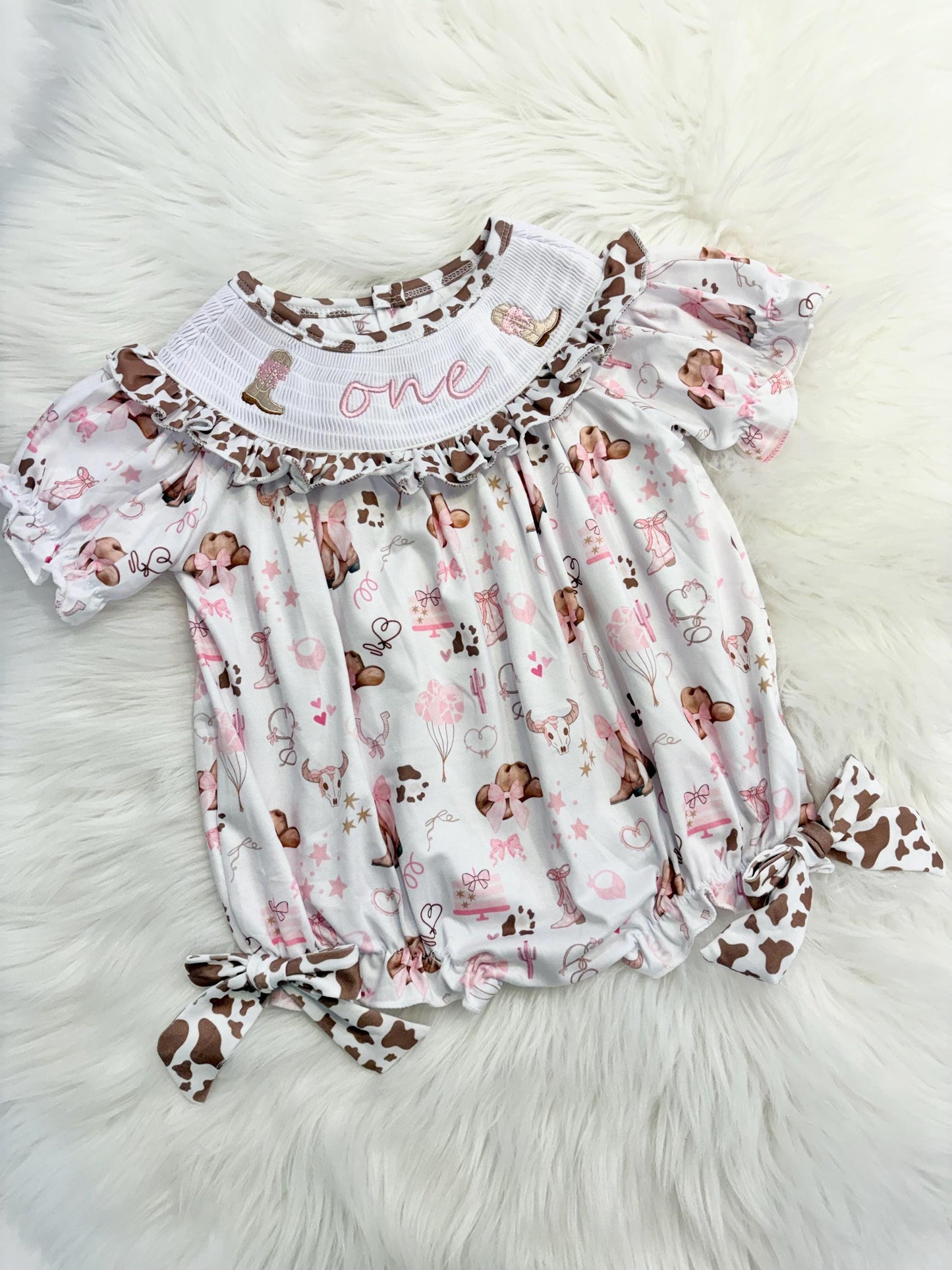 my first rodeo cowgirl girls first birthday bubble romper outfit pink bows brown cow print first birthday holy cow i'm one girl romper pink and white outfit, cowgirl boots pink smocked dress first birthday embroidered cow smocked short sleeve 1st birthday outfit ruffle dress baby girls, the mod mango