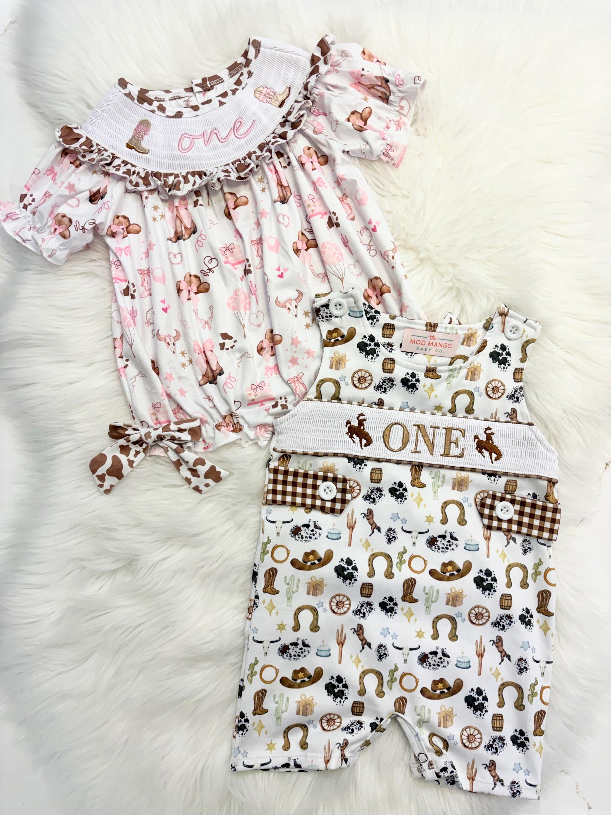 Rodeo Cowgirl 1st Birthday Smocked Romper: Holy Cow I'm ONE Pink Ruffles and Bows