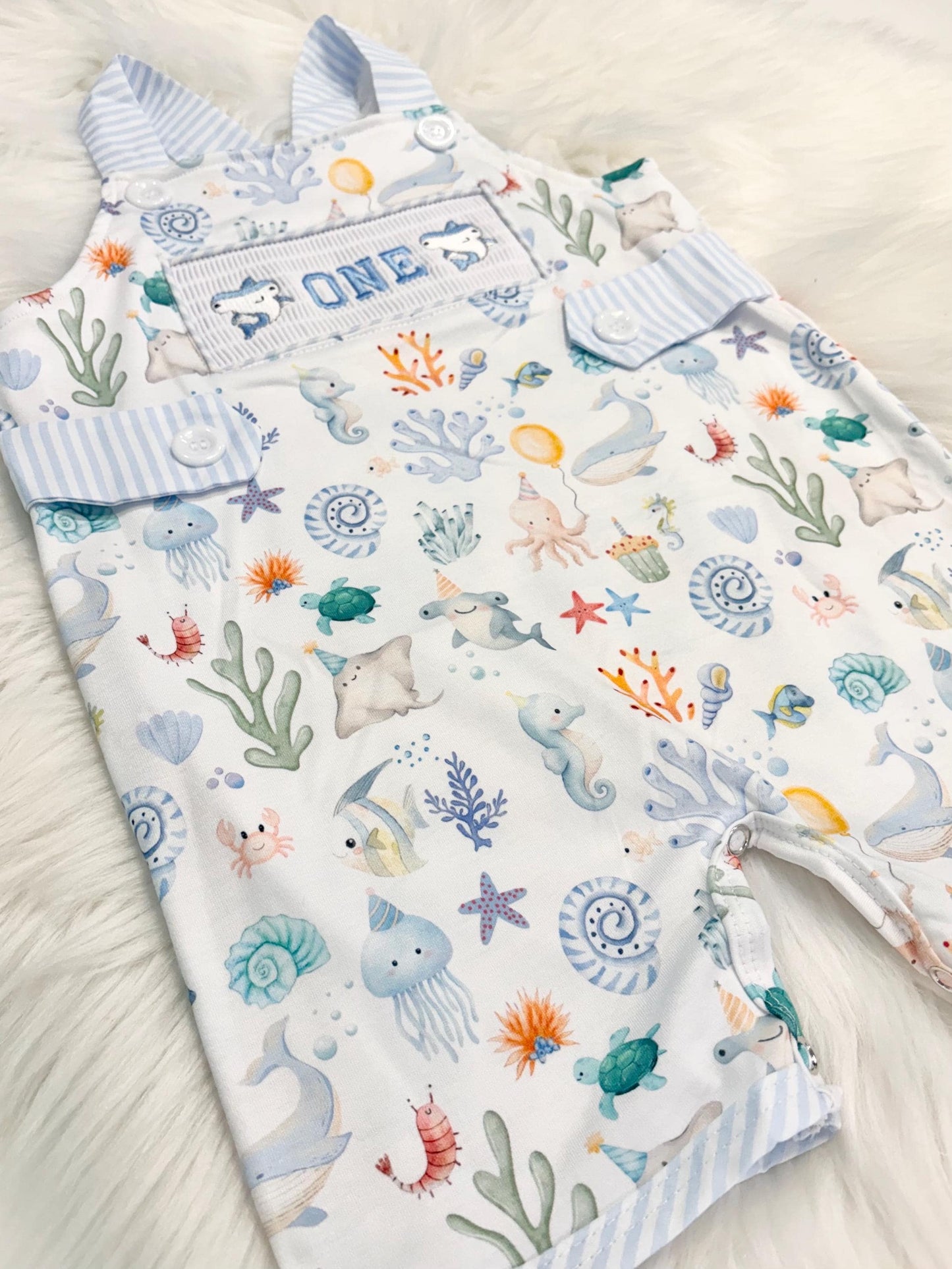 oneder the sea cake smash outfit first birthday boy romper under the sea ocean summer baby blue green white orange blue smash cake outfit overalls, ONE smocked romper first birthday sea ocean creatures party fish, beach ocean shark whale seashells octopus outdoors embroidered smocked spring summer 1st birthday boy outfit romper baby boys cake smash outfit, the mod mango baby boutique co