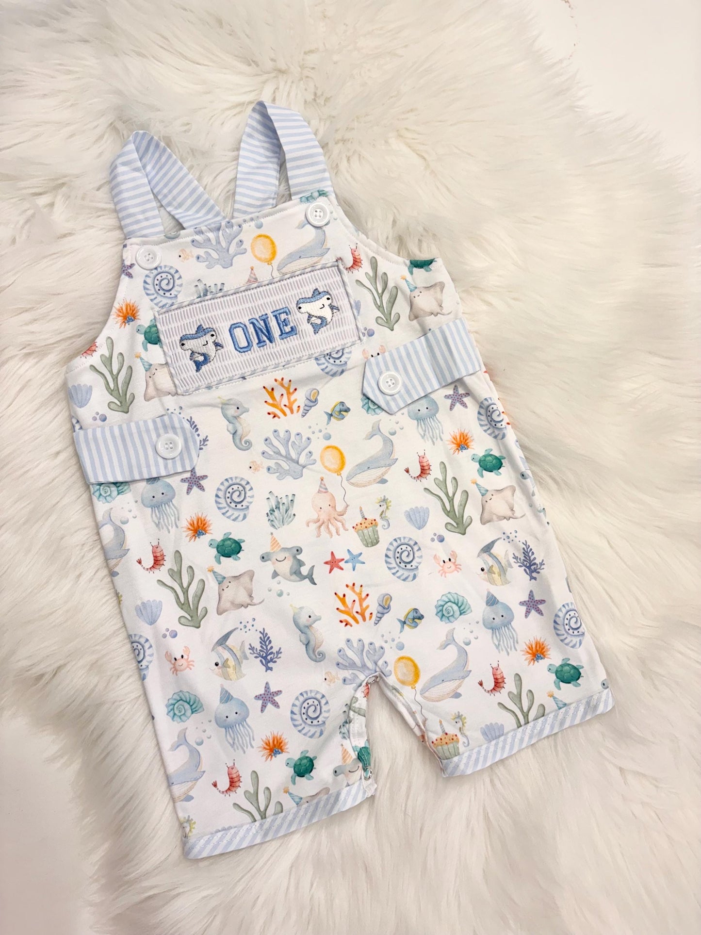 oneder the sea cake smash outfit first birthday boy romper under the sea ocean summer baby blue green white orange blue smash cake outfit overalls, ONE smocked romper first birthday sea ocean creatures party fish, beach ocean shark whale seashells octopus outdoors embroidered smocked spring summer 1st birthday boy outfit romper baby boys cake smash outfit, the mod mango baby boutique co