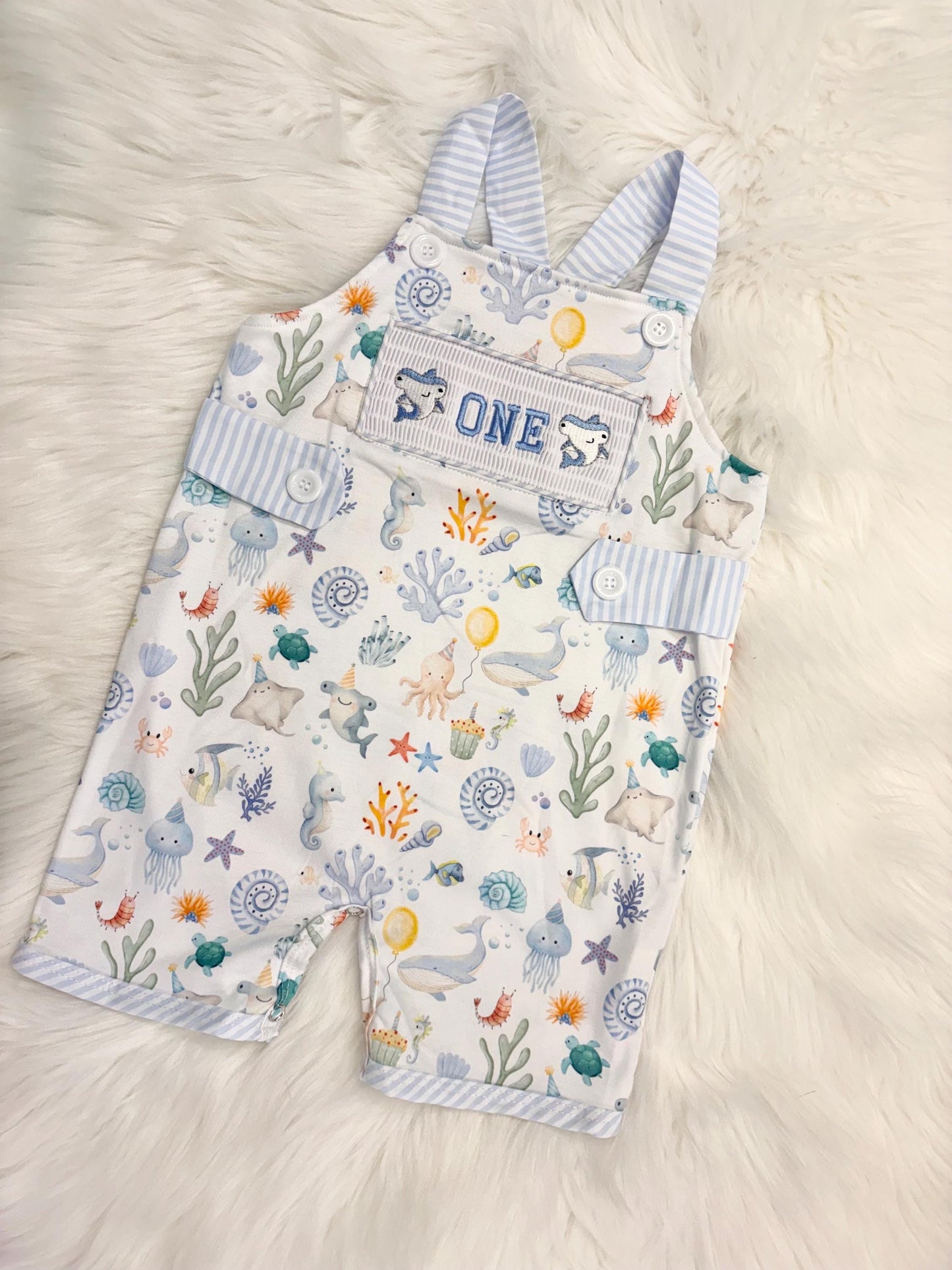 oneder the sea cake smash outfit first birthday boy romper under the sea ocean summer baby blue green white orange blue smash cake outfit overalls, ONE smocked romper first birthday sea ocean creatures party fish, beach ocean shark whale seashells octopus outdoors embroidered smocked spring summer 1st birthday boy outfit romper baby boys cake smash outfit, the mod mango baby boutique co