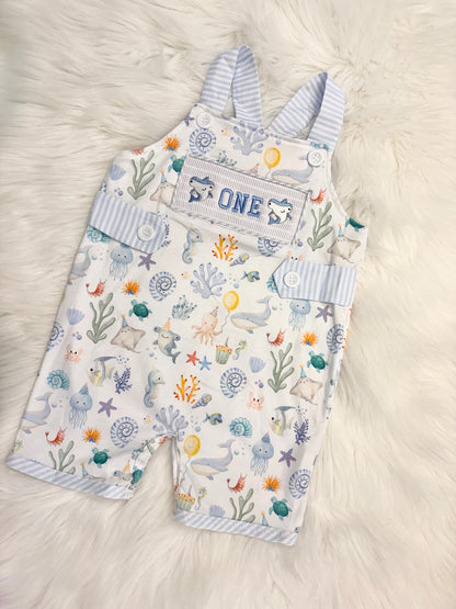 oneder the sea cake smash outfit first birthday boy romper under the sea ocean summer baby blue green white orange blue smash cake outfit overalls, ONE smocked romper first birthday sea ocean creatures party fish, beach ocean shark whale seashells octopus outdoors embroidered smocked spring summer 1st birthday boy outfit romper baby boys cake smash outfit, the mod mango baby boutique co