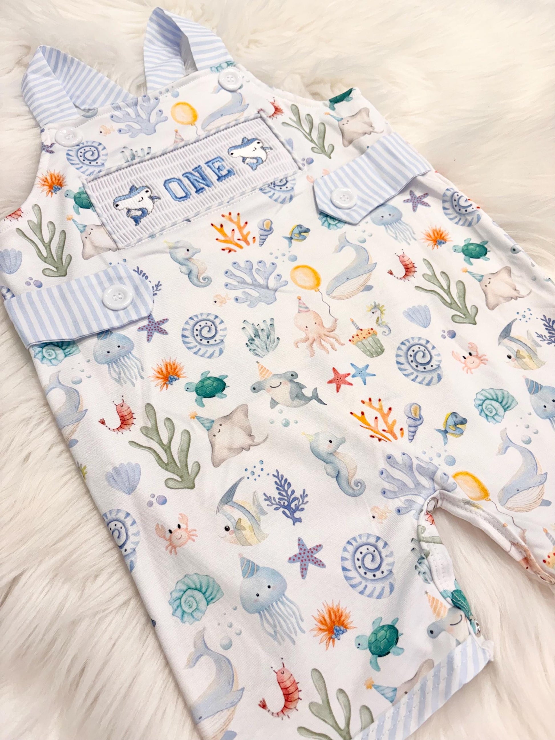oneder the sea cake smash outfit first birthday boy romper under the sea ocean summer baby blue green white orange blue smash cake outfit overalls, ONE smocked romper first birthday sea ocean creatures party fish, beach ocean shark whale seashells octopus outdoors embroidered smocked spring summer 1st birthday boy outfit romper baby boys cake smash outfit, the mod mango baby boutique co