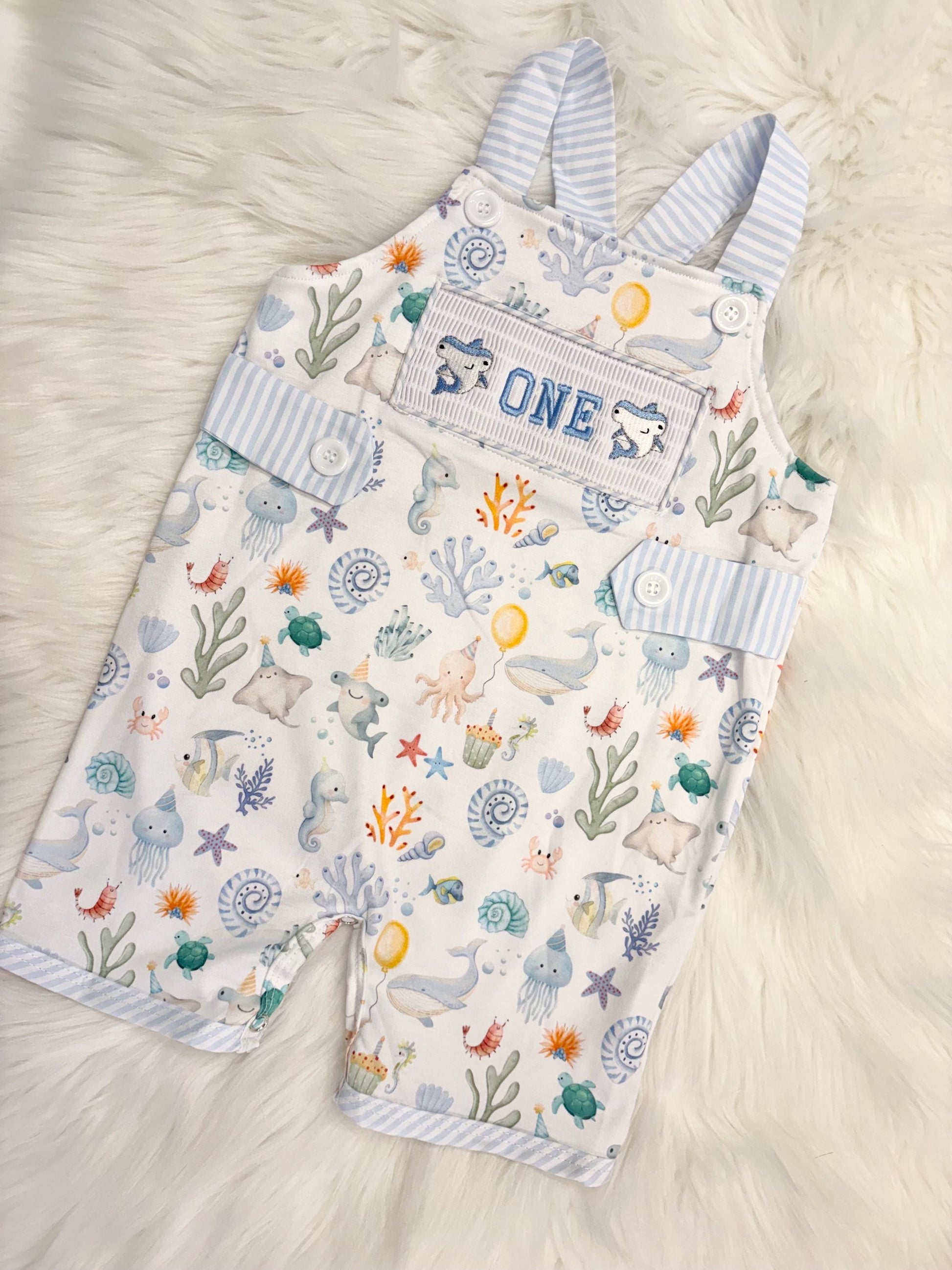 oneder the sea cake smash outfit first birthday boy romper under the sea ocean summer baby blue green white orange blue smash cake outfit overalls, ONE smocked romper first birthday sea ocean creatures party fish, beach ocean shark whale seashells octopus outdoors embroidered smocked spring summer 1st birthday boy outfit romper baby boys cake smash outfit, the mod mango baby boutique co