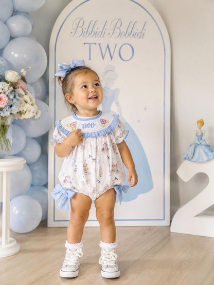 bippity boppity two, bibbidi bobbidi two disney princess girls second birthday bubble romper outfit, once once upon a time blue bows 2nd birthday girl princess romper pink and white outfit, second birthday embroidered carriage smocked short sleeve 2nd birthday outfit ruffle dress baby girls