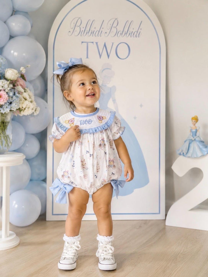 bippity boppity two, bibbidi bobbidi two disney princess girls second birthday bubble romper outfit, once once upon a time blue bows 2nd birthday girl princess romper pink and white outfit, second birthday embroidered carriage smocked short sleeve 2nd birthday outfit ruffle dress baby girls