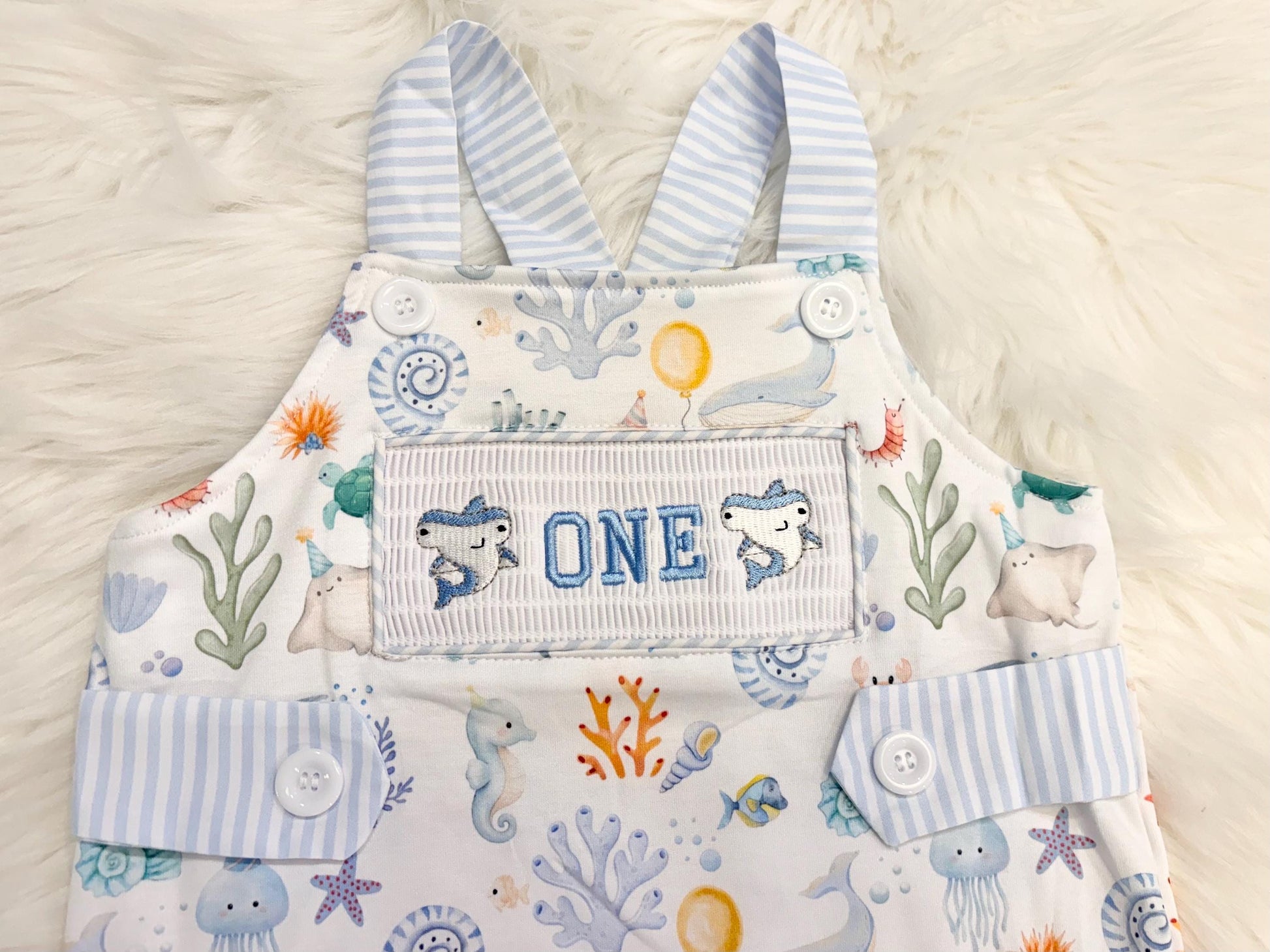 oneder the sea cake smash outfit first birthday boy romper under the sea ocean summer baby blue green white orange blue smash cake outfit overalls, ONE smocked romper first birthday sea ocean creatures party fish, beach ocean shark whale seashells octopus outdoors embroidered smocked spring summer 1st birthday boy outfit romper baby boys cake smash outfit, the mod mango baby boutique co