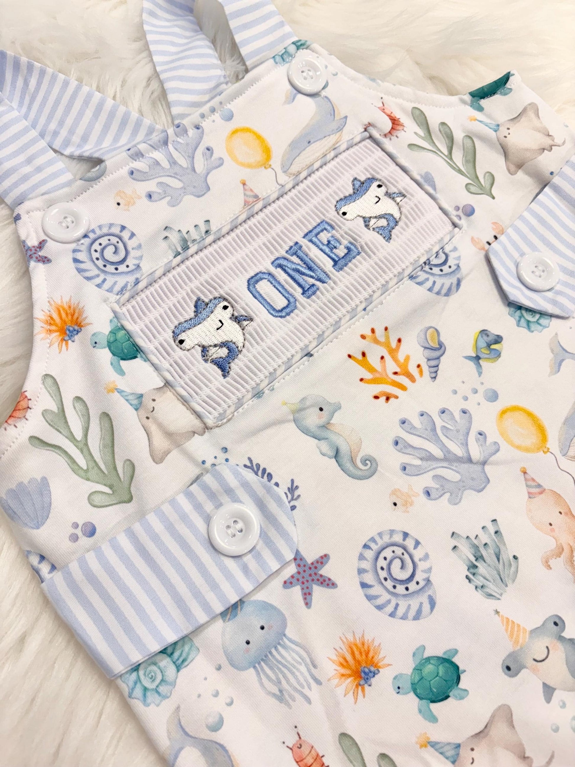 oneder the sea cake smash outfit first birthday boy romper under the sea ocean summer baby blue green white orange blue smash cake outfit overalls, ONE smocked romper first birthday sea ocean creatures party fish, beach ocean shark whale seashells octopus outdoors embroidered smocked spring summer 1st birthday boy outfit romper baby boys cake smash outfit, the mod mango baby boutique co